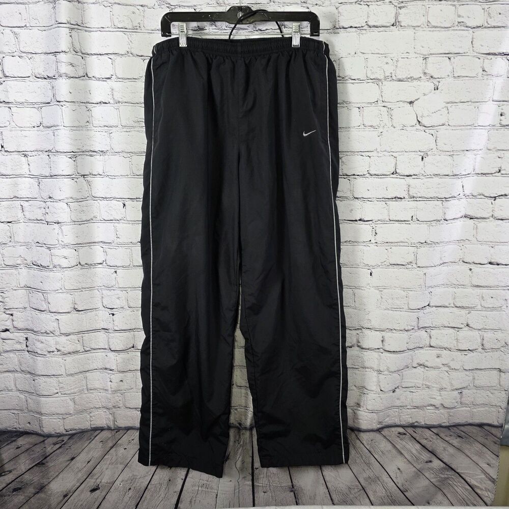 Nike Dri-FIT Men’s XL Black Mesh Lined Ankle Zip Track Pants